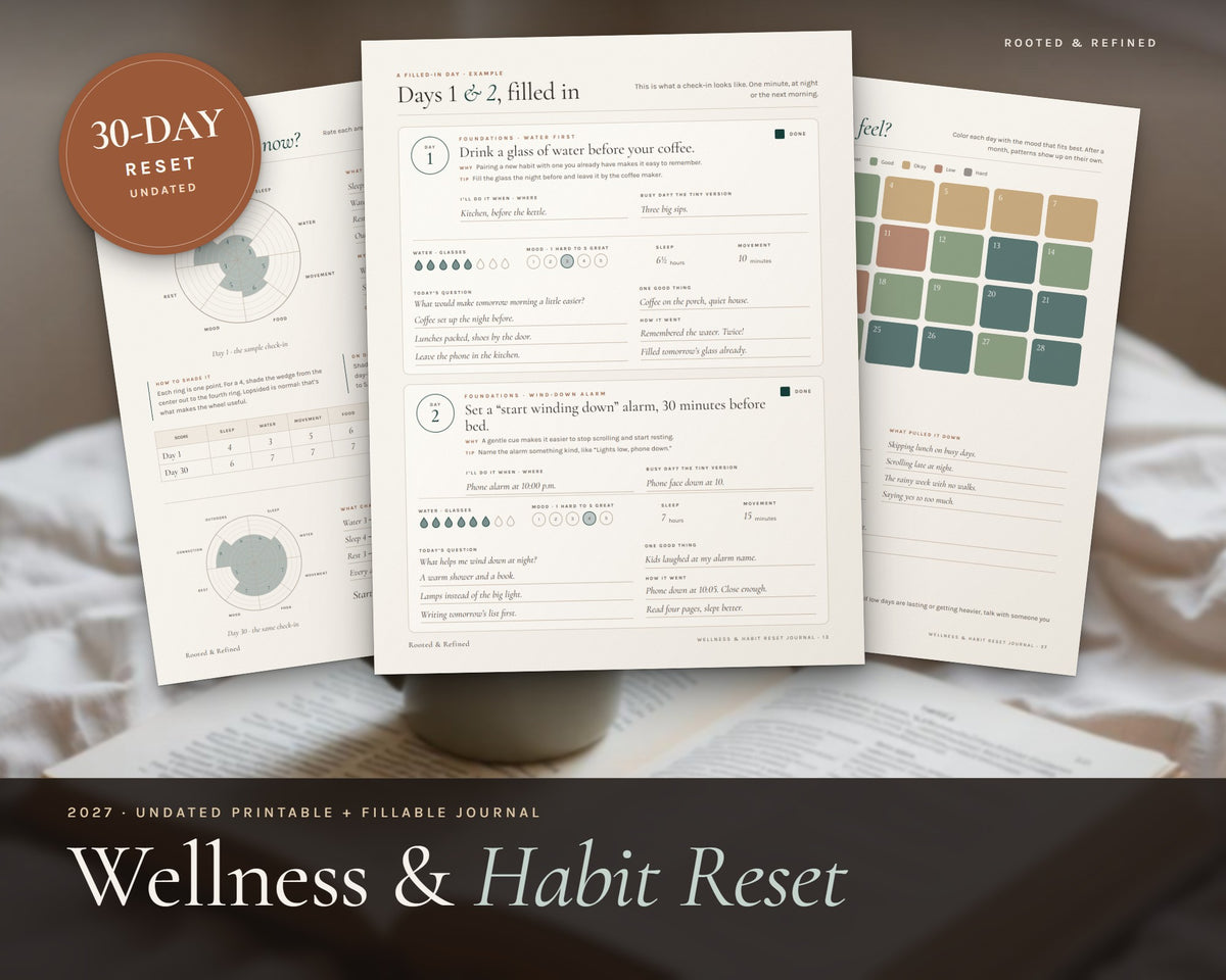 Wellness Journal printable from Rooted & Refined: cover preview with the printed pages styled on a table