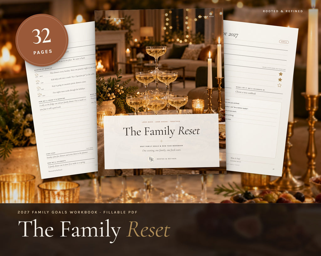 2027 Family Goals Workbook printable from Rooted & Refined: cover preview with the printed pages styled on a table