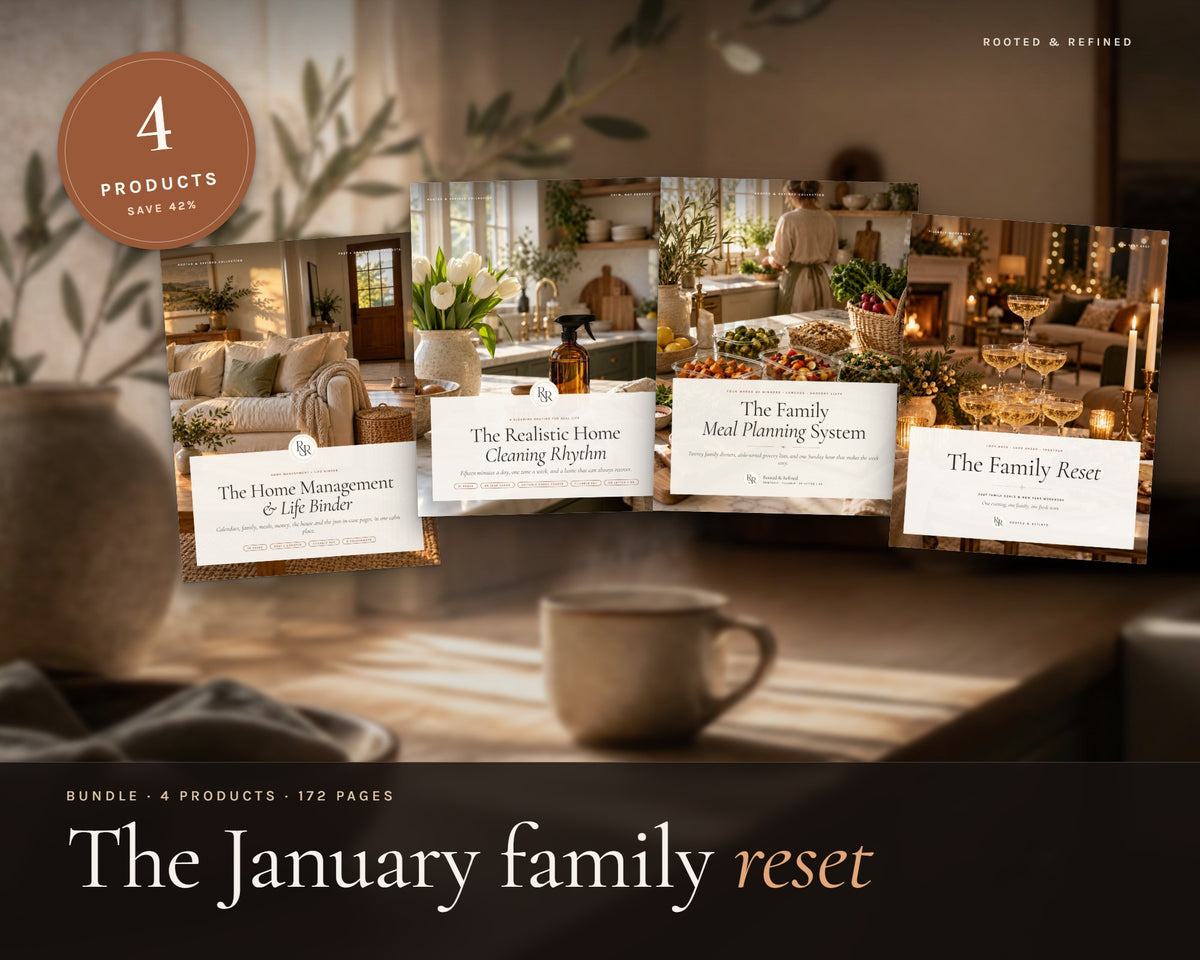 January Family Reset Bundle printable from Rooted & Refined: cover preview with the printed pages styled on a table