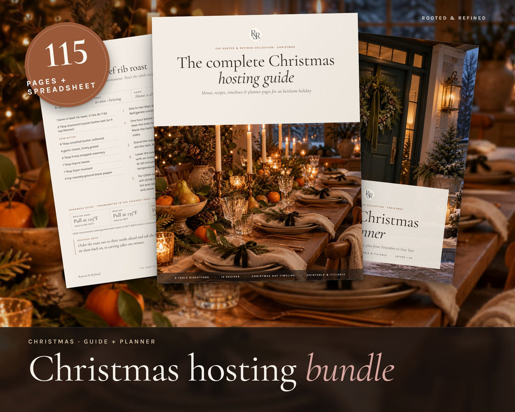 Christmas Planner Bundle printable from Rooted & Refined: cover preview with the printed pages styled on a table