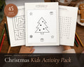 Christmas Activity Pack for Kids printable from Rooted & Refined: cover preview with the printed pages styled on a table