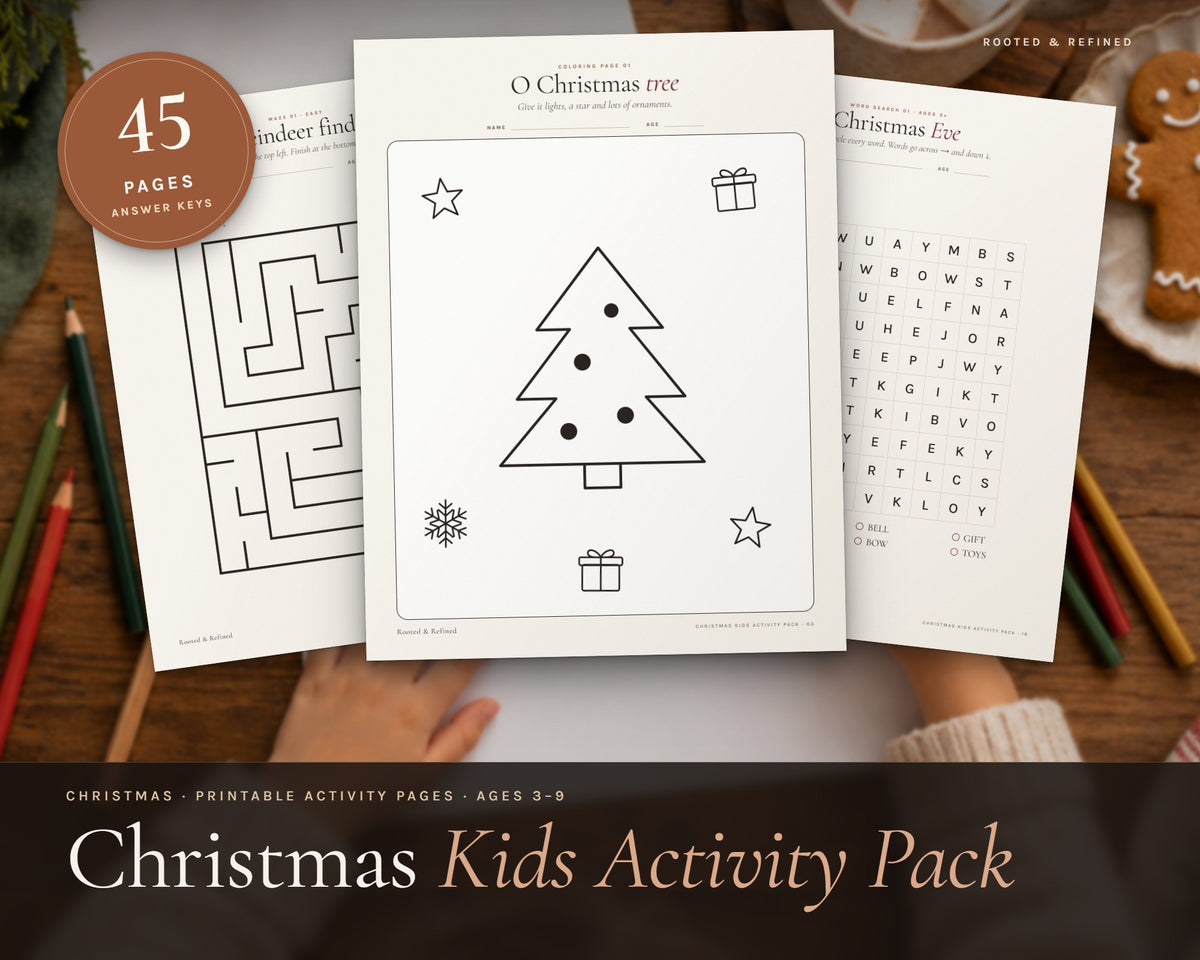 Christmas Activity Pack for Kids printable from Rooted & Refined: cover preview with the printed pages styled on a table