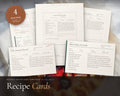 Recipe Card Templates printable from Rooted & Refined: cover preview with the printed pages styled on a table