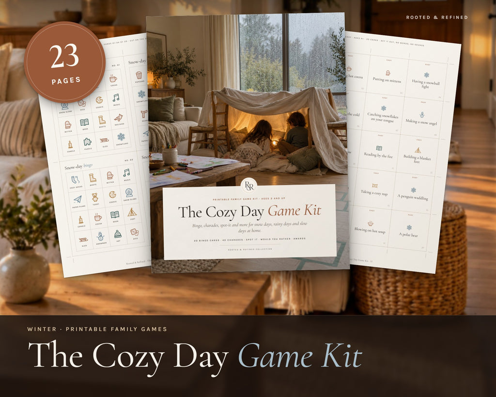 Winter Family Games printable from Rooted & Refined: cover preview with the printed pages styled on a table