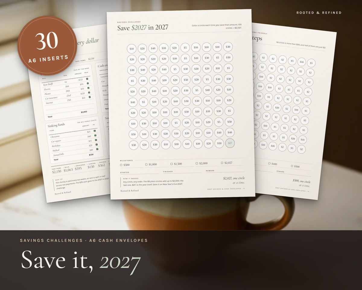 Savings Challenge 2027 printable from Rooted & Refined: cover preview with the printed pages styled on a table