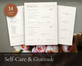 Self Care Journal printable from Rooted & Refined: cover preview with the printed pages styled on a table