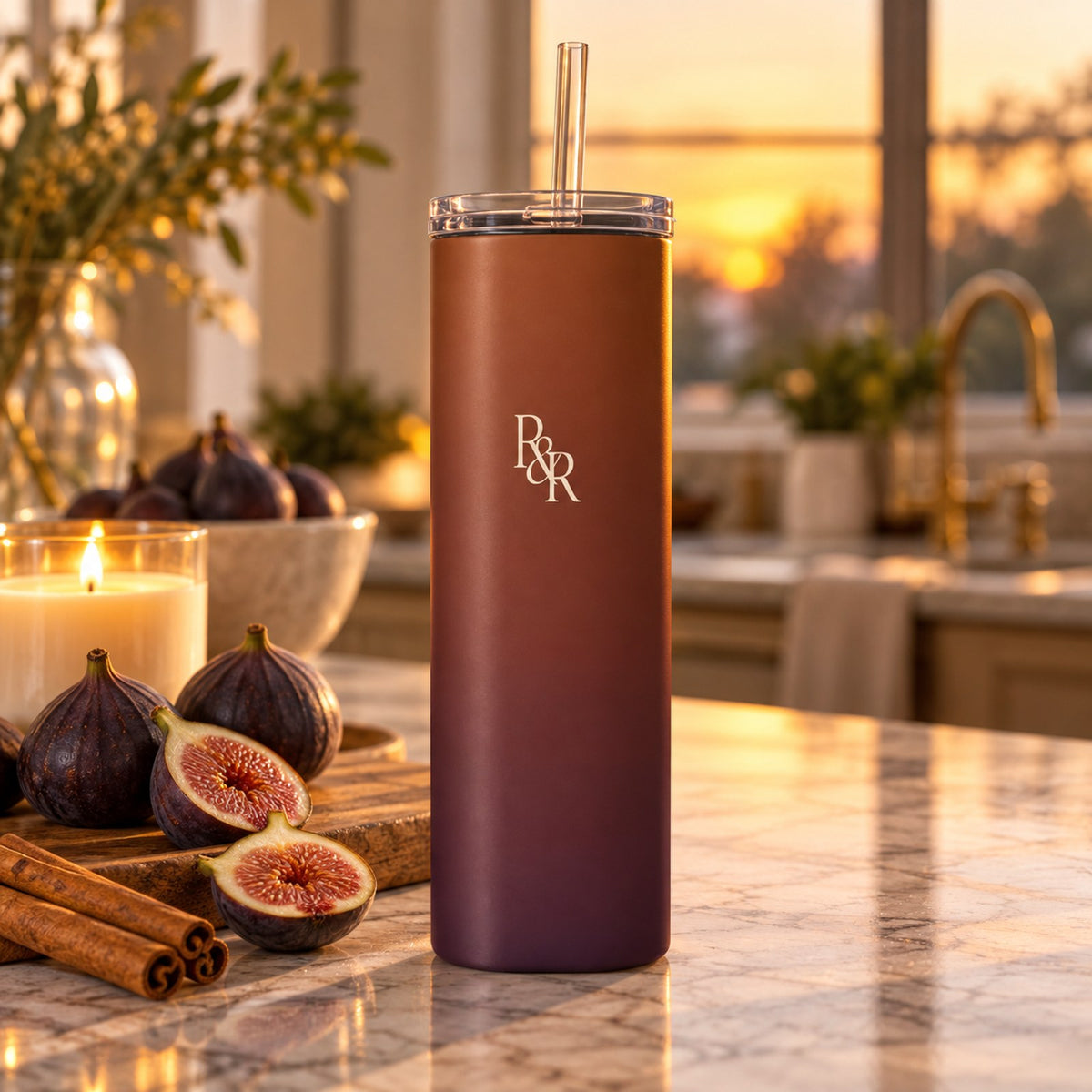 Cinnamon to fig ombré tumbler with a cream R&R monogram on a marble counter with figs, cinnamon and a candle