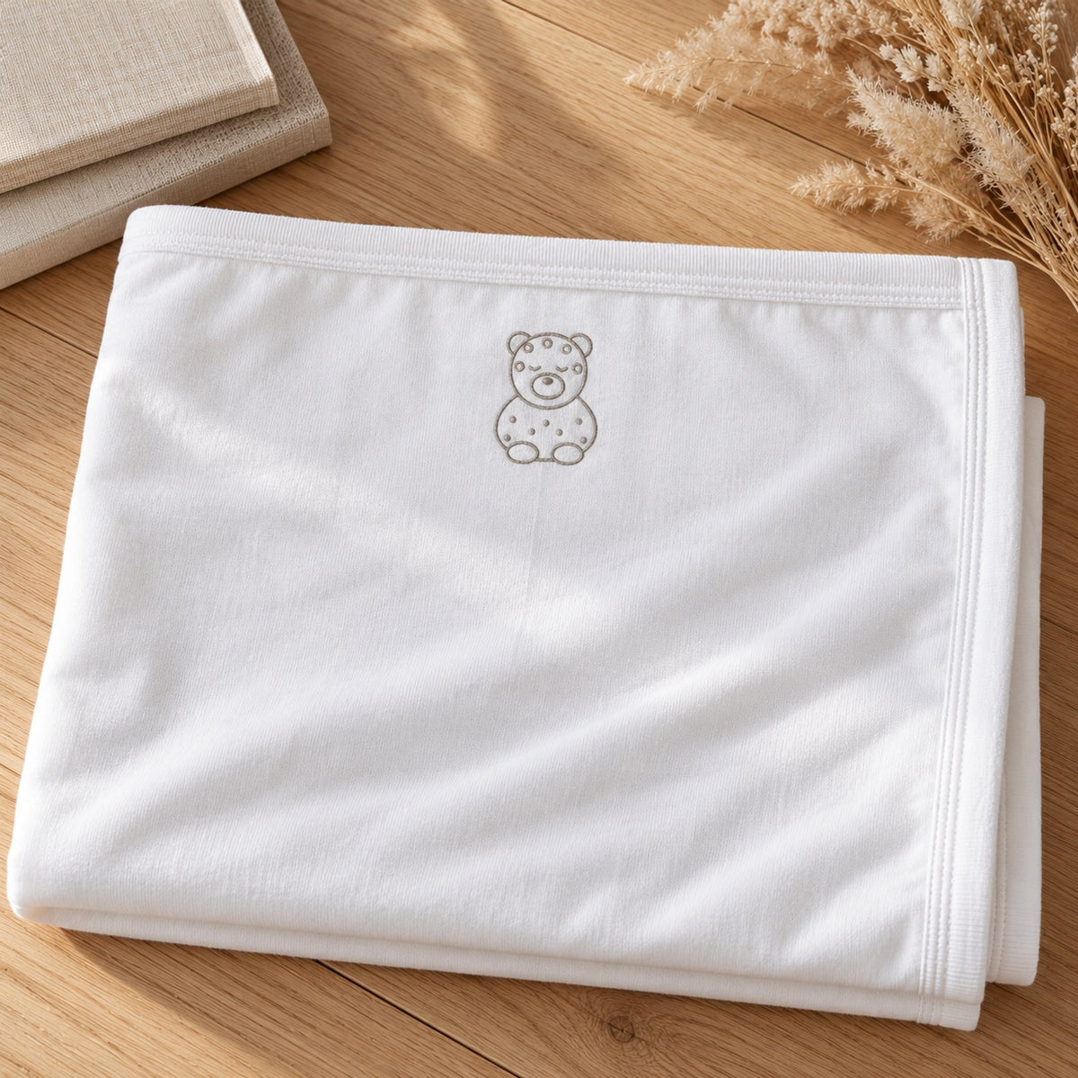 Little Jaguar Embroidered Cotton Baby Blanket by Rooted & Refined