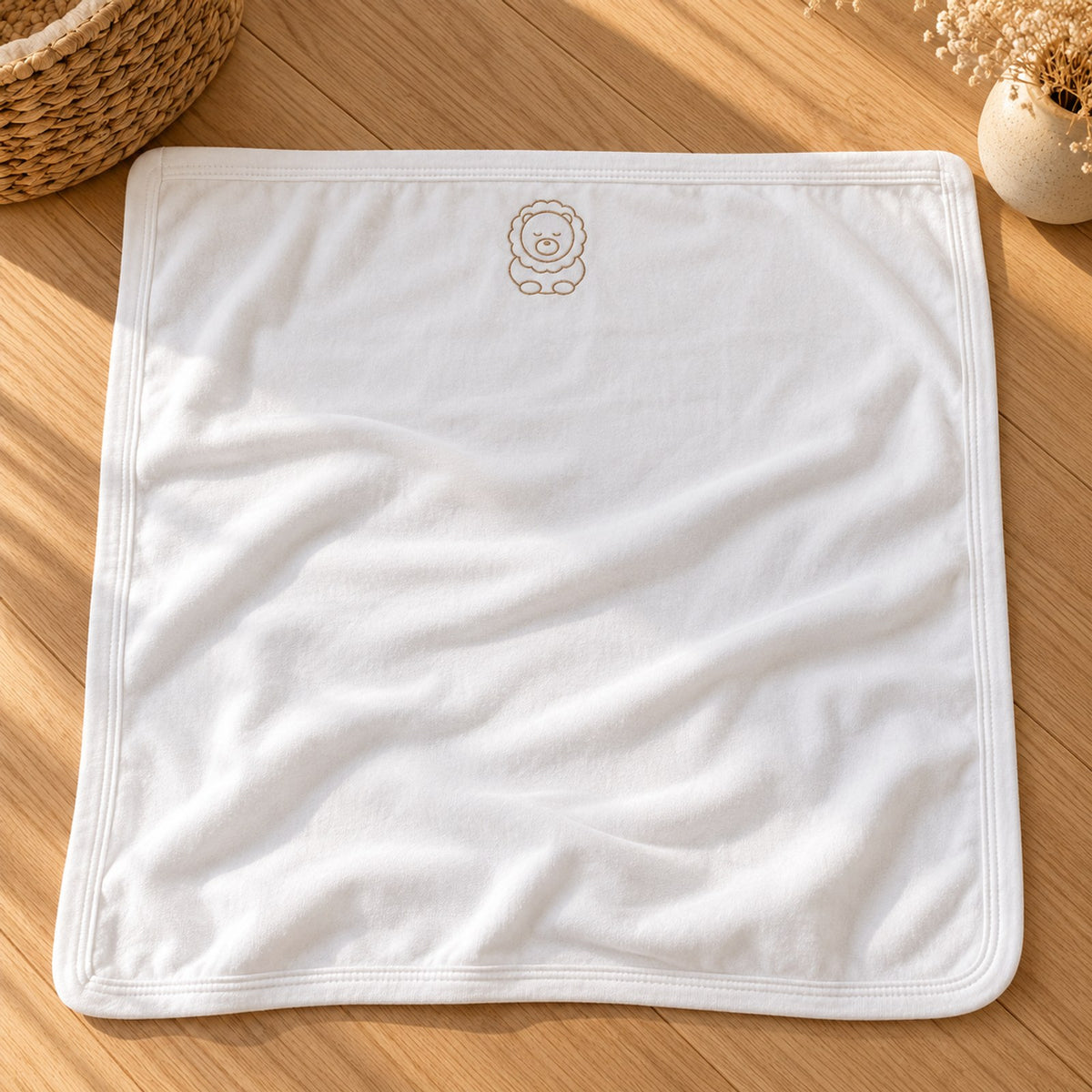 Little Lion Embroidered Cotton Baby Blanket by Rooted & Refined