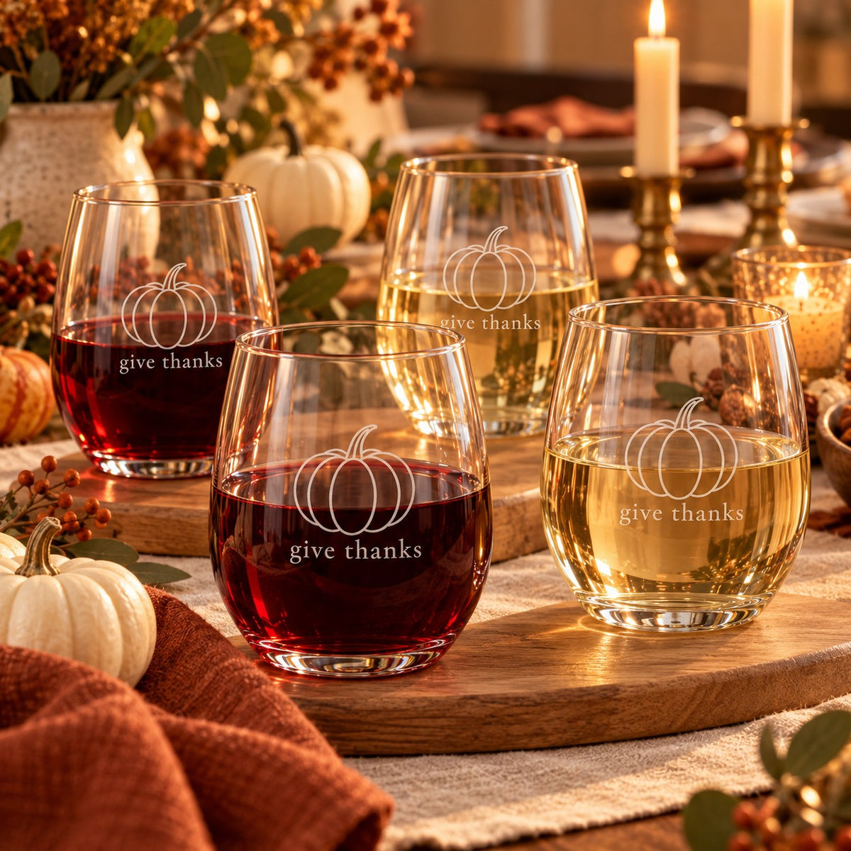 Give Thanks Engraved Wine Glass Set of 4 by Rooted & Refined: four etched stemless glasses styled together