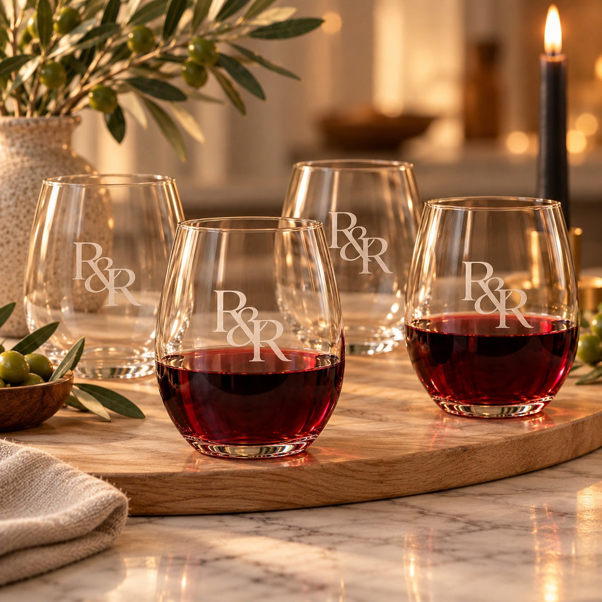 R&R Monogram Engraved Wine Glass Set of 4 by Rooted & Refined: four etched stemless glasses styled together