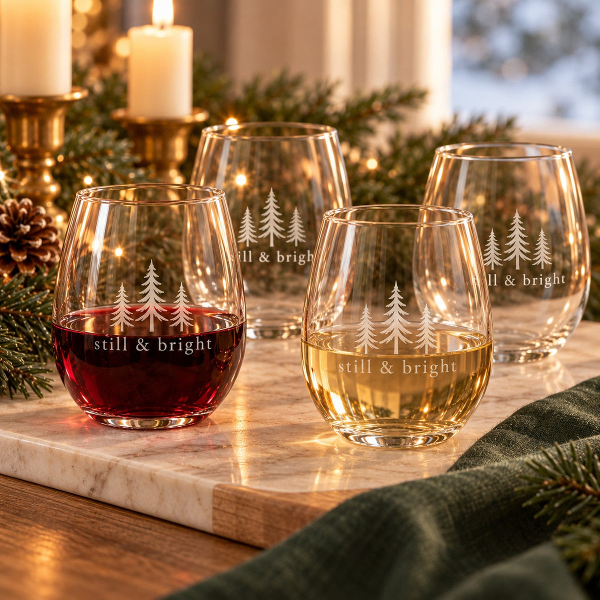 Still & Bright Evergreen Engraved Wine Glass Set of 4 by Rooted & Refined: four etched stemless glasses styled together