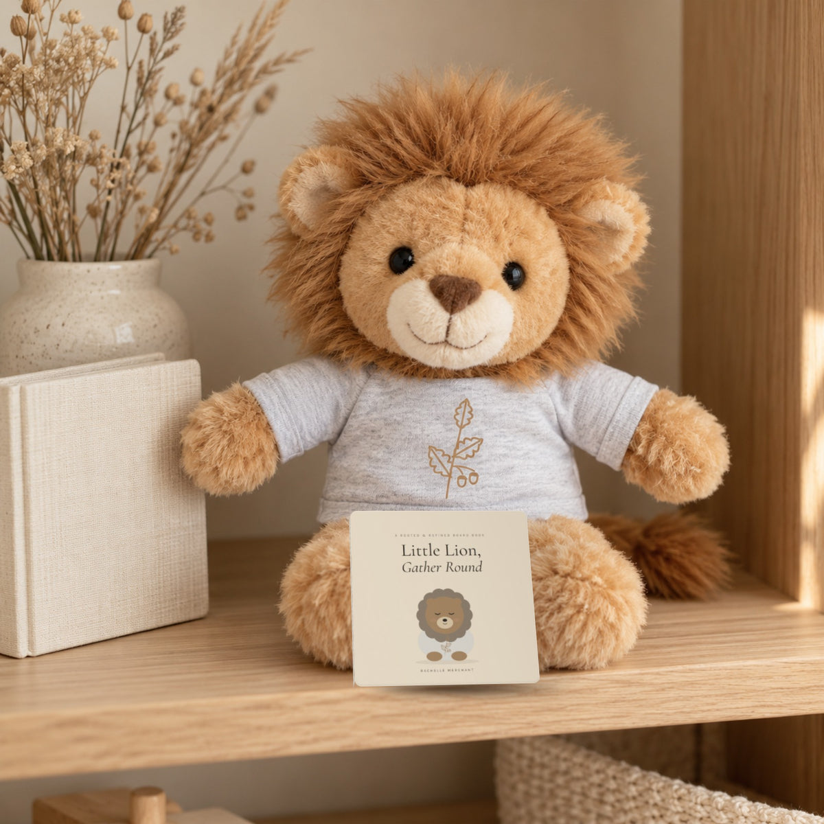 Little Lion Book & Plush Gift Set by Rooted & Refined: the Little Lion, Gather Round board book with the Little Lion plush on a nursery shelf