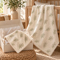 Olive Branch New Baby Gift Set by Rooted & Refined: matching minky lovey and minky baby blanket styled in a calm nursery