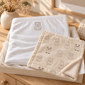 Little Jaguar Nursery Pair Gift Set by Rooted & Refined: embroidered cotton baby blanket with the Little Friends minky lovey in a calm nursery