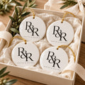 R&R Monogram Ornament Set of 4 by Rooted & Refined: four round ceramic ornaments styled together