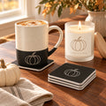 Pumpkin coffee lover gift set: line-drawn pumpkin engraved mug, matching coasters and a lit frosted glass candle