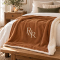 R&R Monogram Sherpa Fleece Blanket in Toffee, styled at home