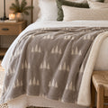 Evergreen Pattern Sherpa Fleece Blanket in Warm Grey, styled at home