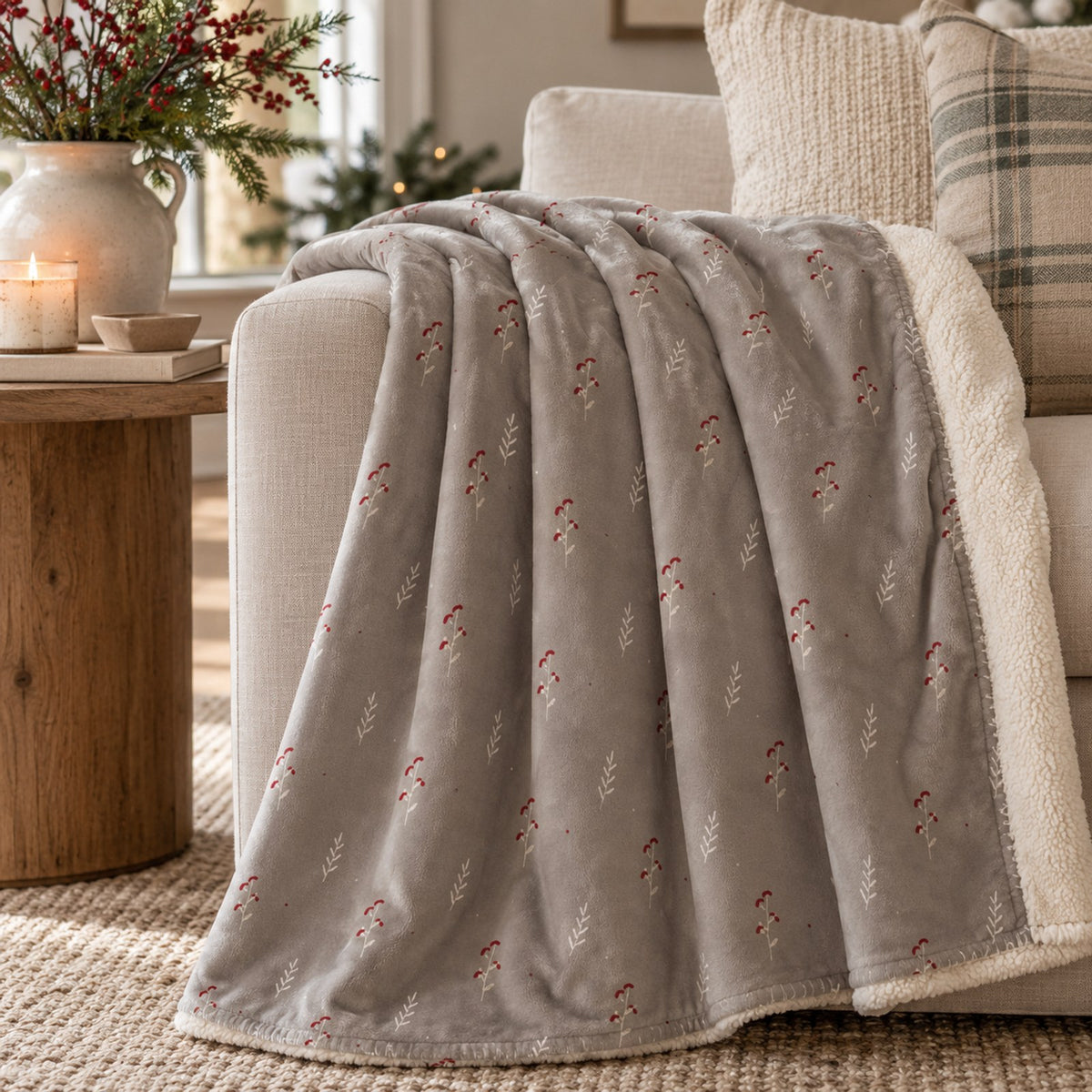 Winter Berry Sherpa Fleece Blanket in Warm Grey, styled at home