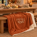 Gather Olive Branch Sherpa Fleece Blanket in Burnt Orange, styled at home