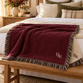 Small R&R Monogram Woven Throw Blanket in Burgundy, styled at home