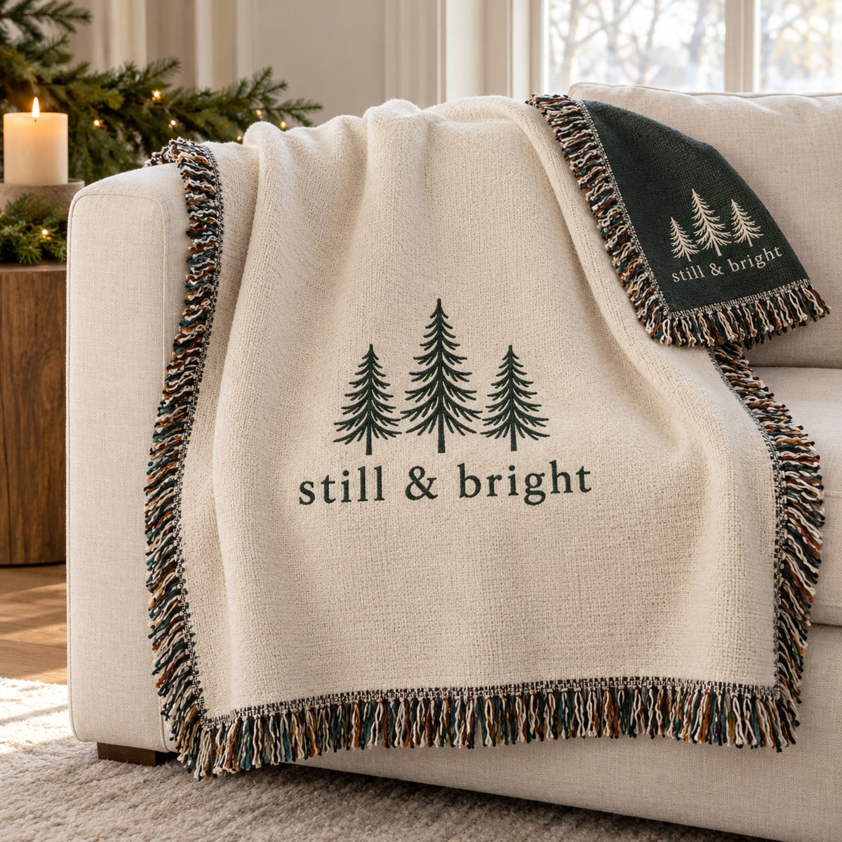Still & Bright woven throw with a colourful fringe