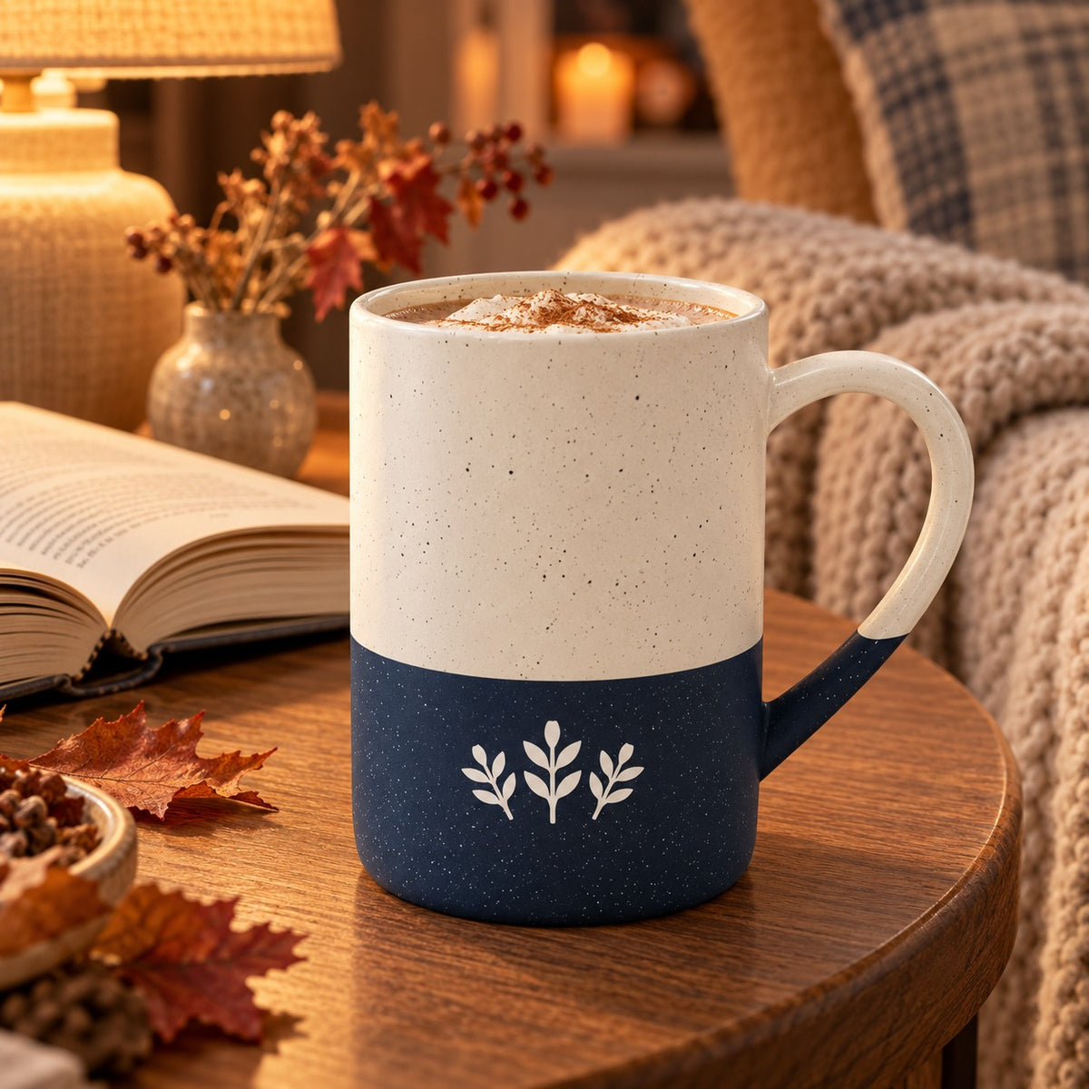 Autumn Sprig Engraved Speckled Mug in Navy Blue, styled at home