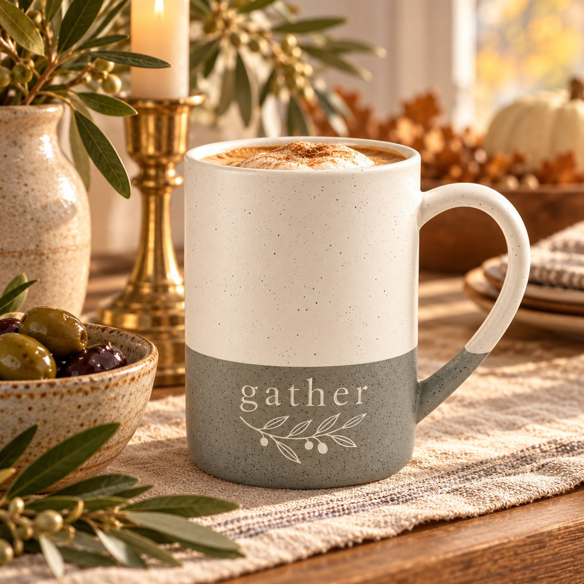 Gather olive sprig engraved speckled mug in Grey on a Thanksgiving sideboard