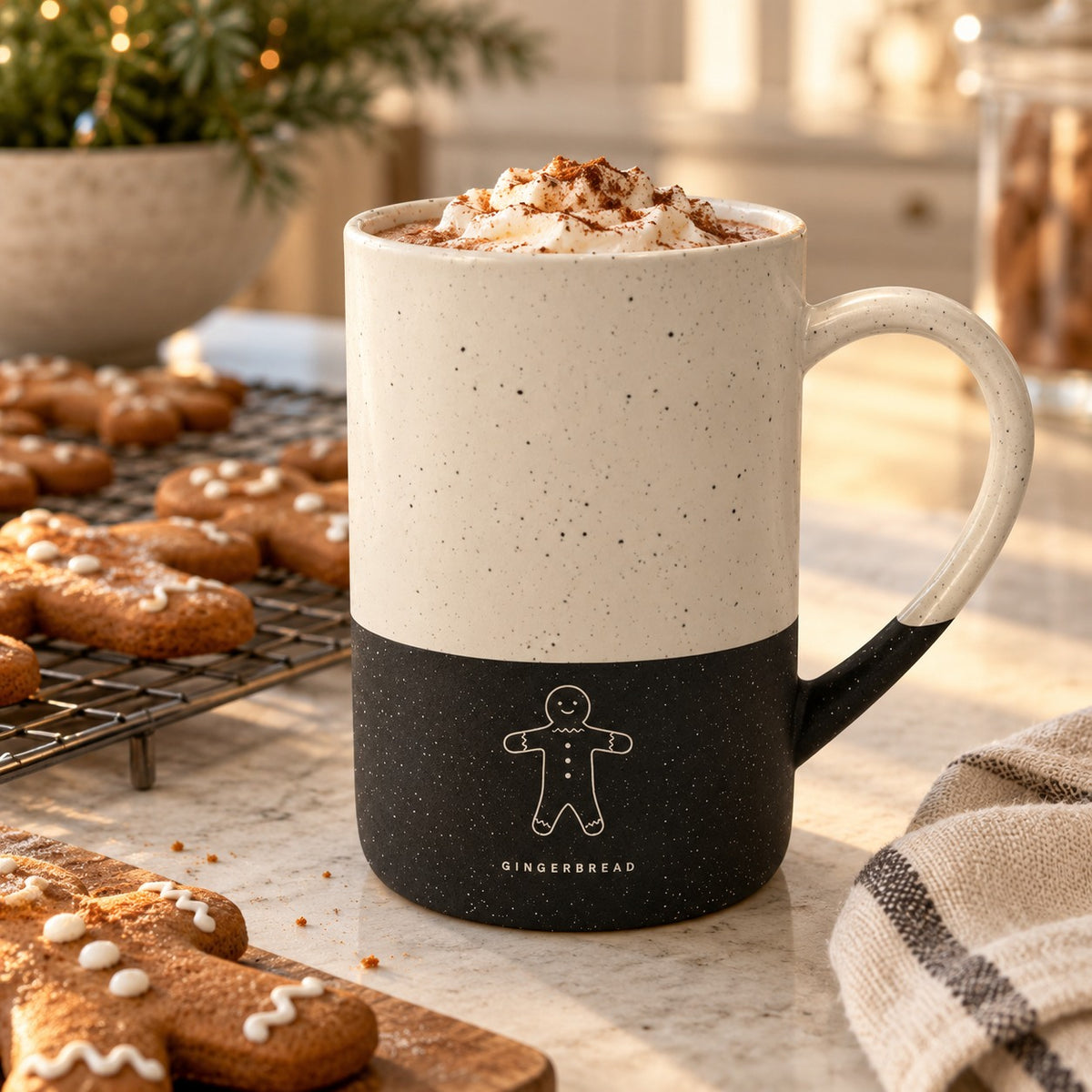 Gingerbread Engraved Speckled Mug in Black, styled at home