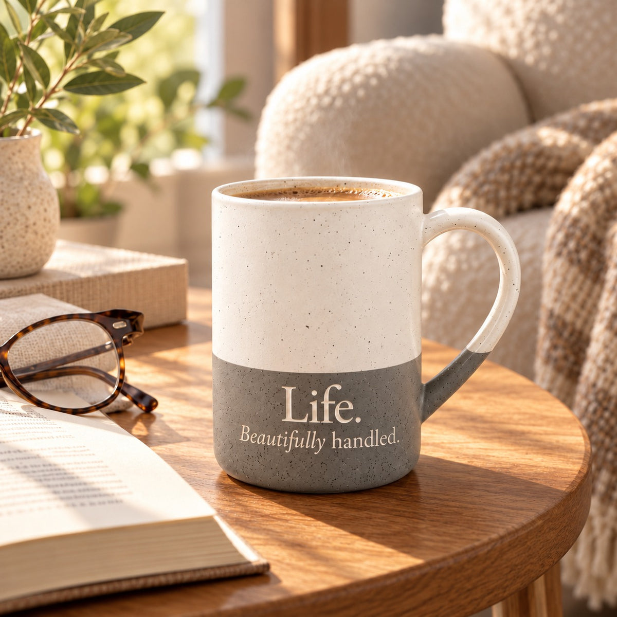 Life. Beautifully Handled. engraved speckled mug in Grey in a cosy reading nook