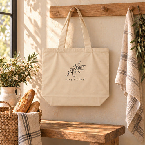 Stay Rooted Olive Branch Organic Cotton Tote in Oyster, styled at home