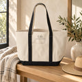 Life. Beautifully Handled. Resort Tote in Natural/Black, styled at home