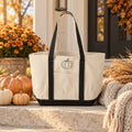 Pumpkin Resort Tote in Natural/Black, styled at home